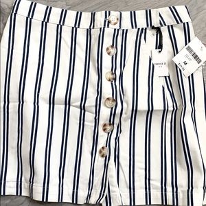 White skirt with navy blue stripes